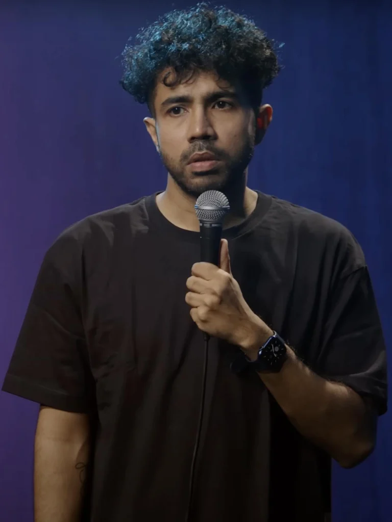 Abhishek Upmanyu performing a live stand-up comedy show on stage