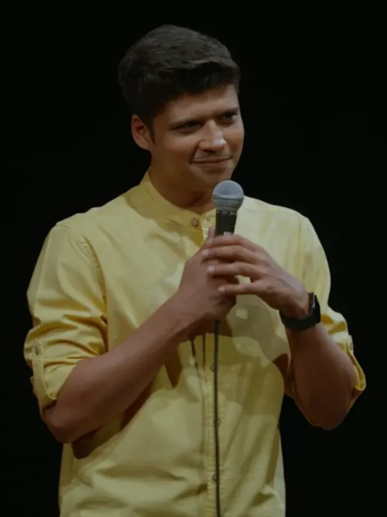 Rahul Subramanian performing stand-up comedy on stage
