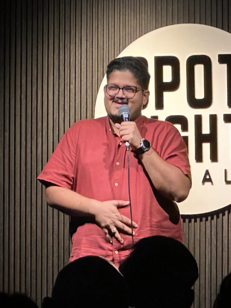 Vishnu Pai performing stand-up comedy at Spotlight Socials MG Road Kochi