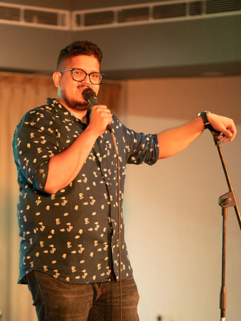 Vishnu Pai performing stand-up comedy at a 500-seater venue in Kochi