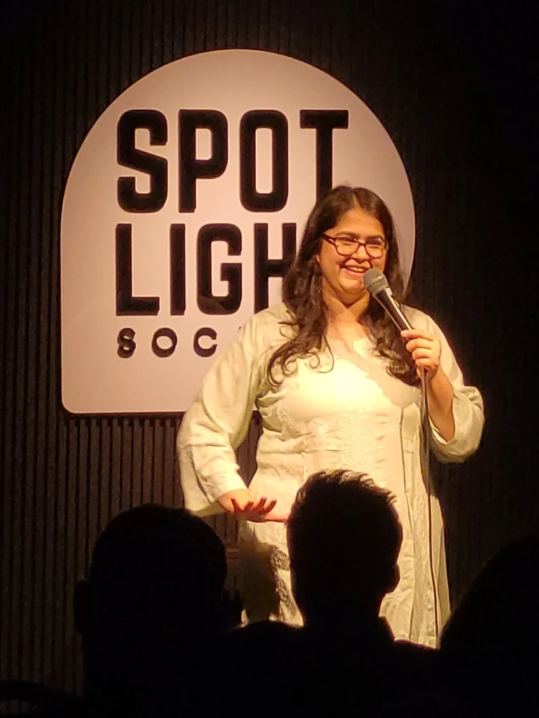 Shreeja Chaturvedi performing live at Spotlight Socials during a Comedy Lounge stand-up comedy show in Kochi.