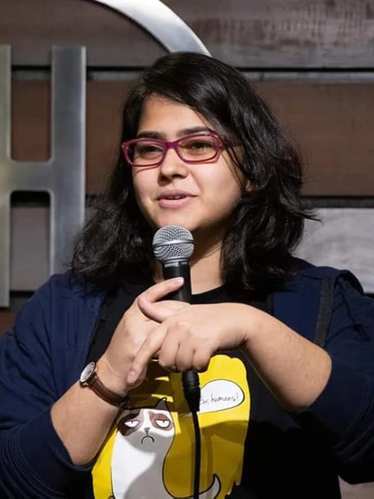 Shreeja Chaturvedi performing stand-up comedy live on stage.